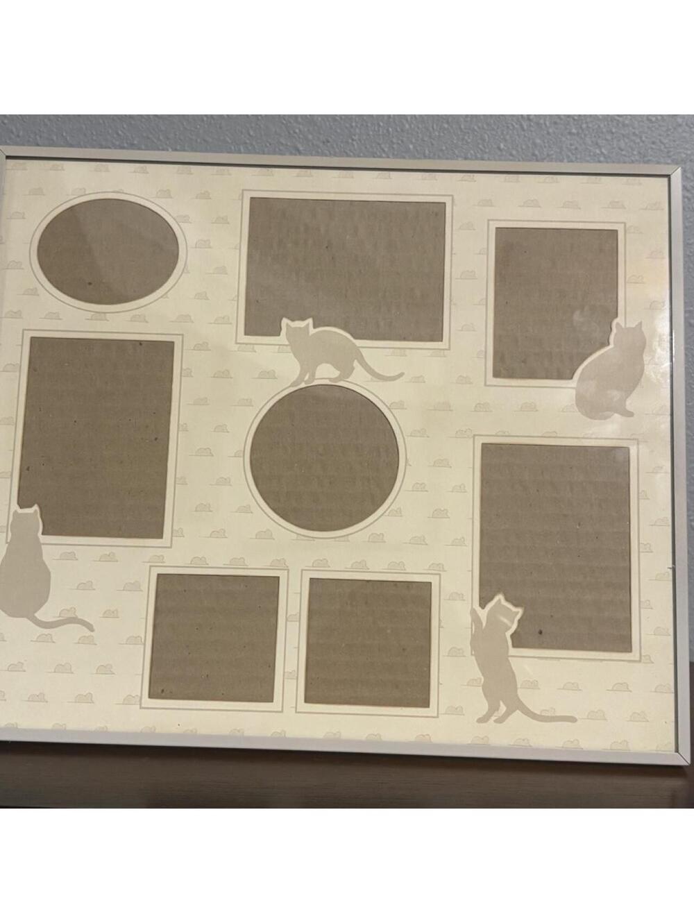 White cat photo frame with multiple picture openings and cat silhouettes